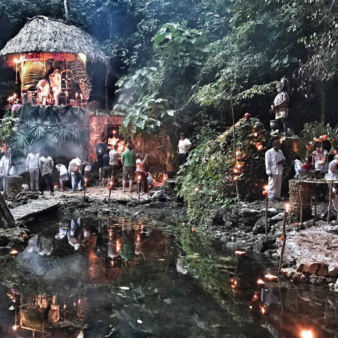 Cenote in Mexico decorated for Hanal Pixan celebtration