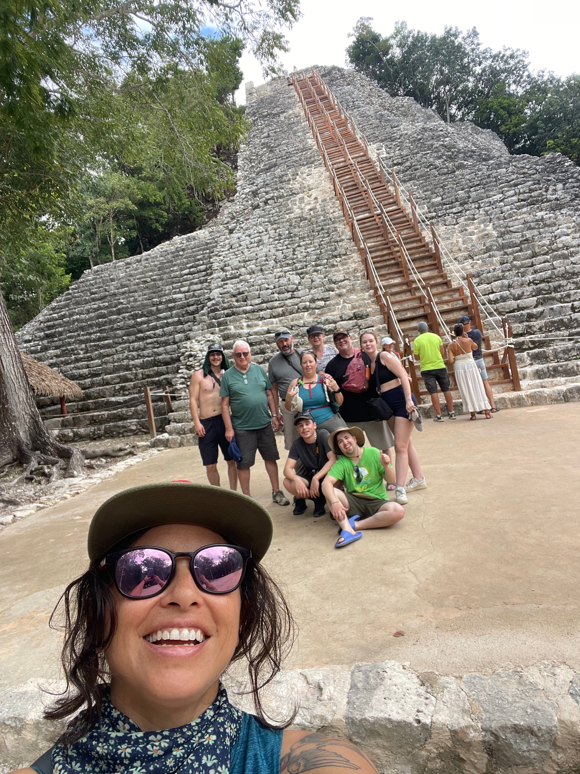 Small group in front of the Nohoch Mul pyramid in Cobá, Crossing Yucatán journey